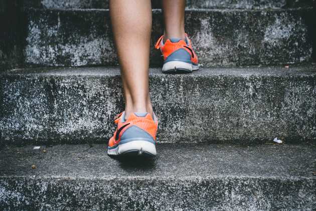 Image of running shoes running up some stairs